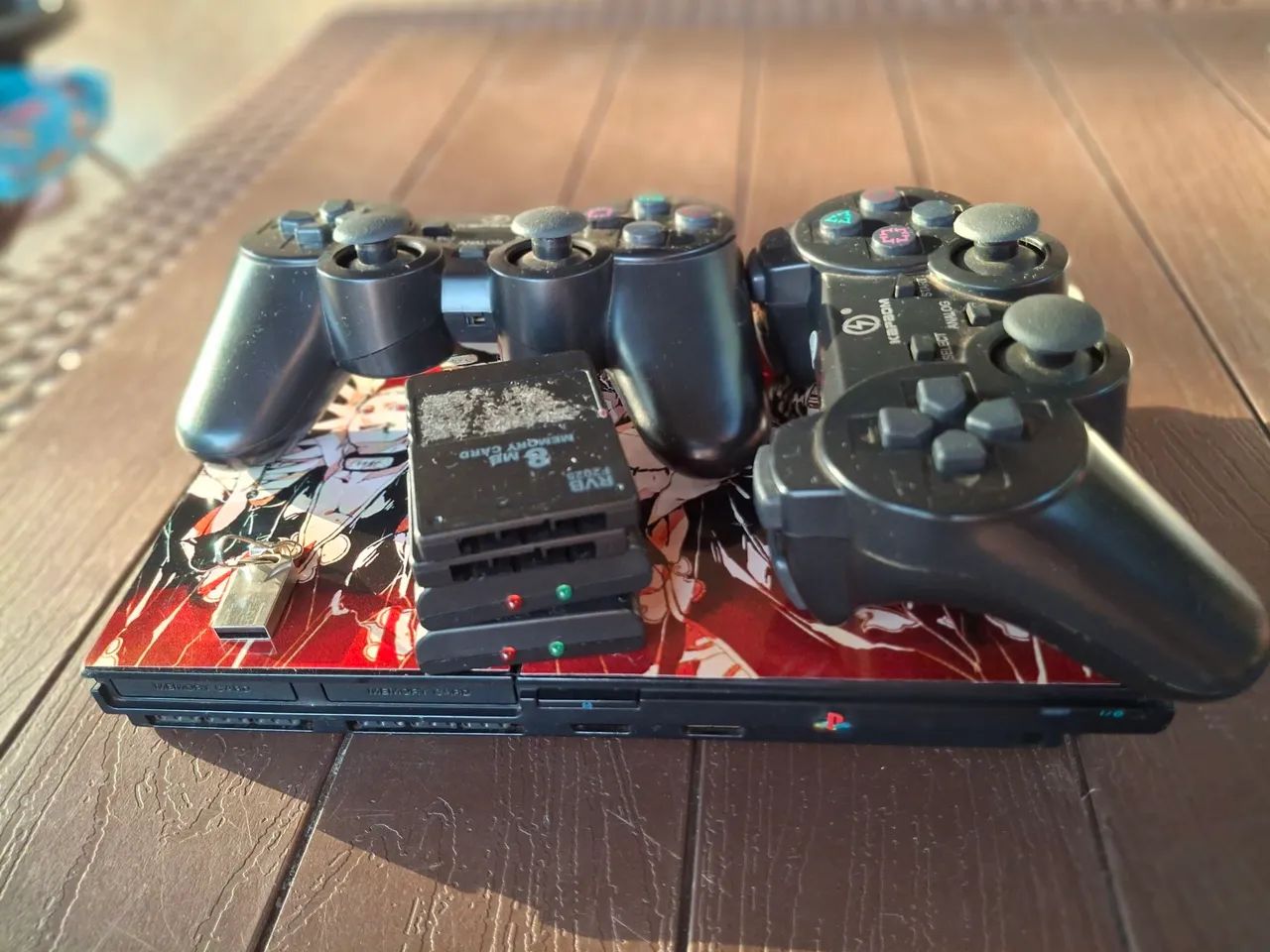 PS2 com pen-drive e leitor de disco