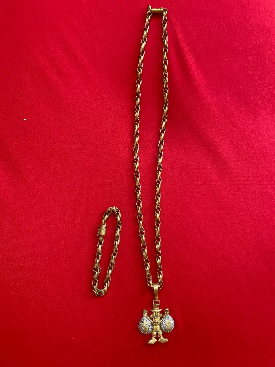 Conjunto corrente e pulseira de moeda antiga 