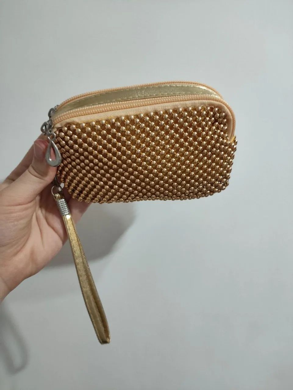 Bolsa nécessaire dourada pequena 