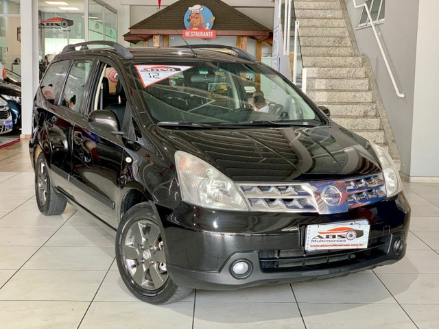 GRANDE LIVINA 1.8 SL AUT! IMPECÁVEL O CARRO! 2012 COM 7 LUGARES.