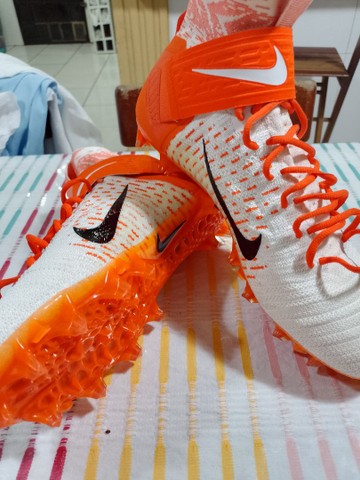 nike alpha chuteira