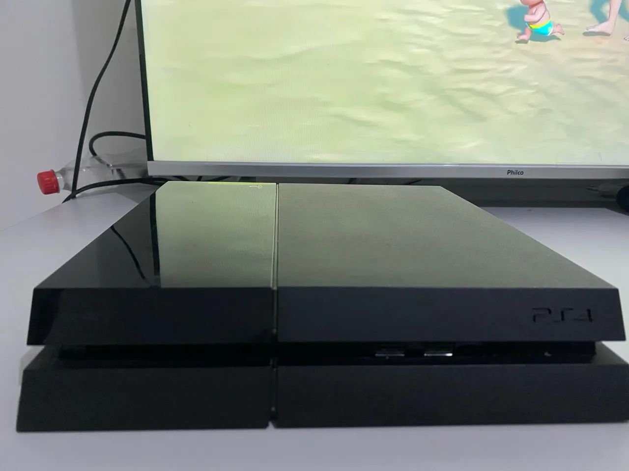 PS4 com jogos Days Gone e GTA V - Foto 2