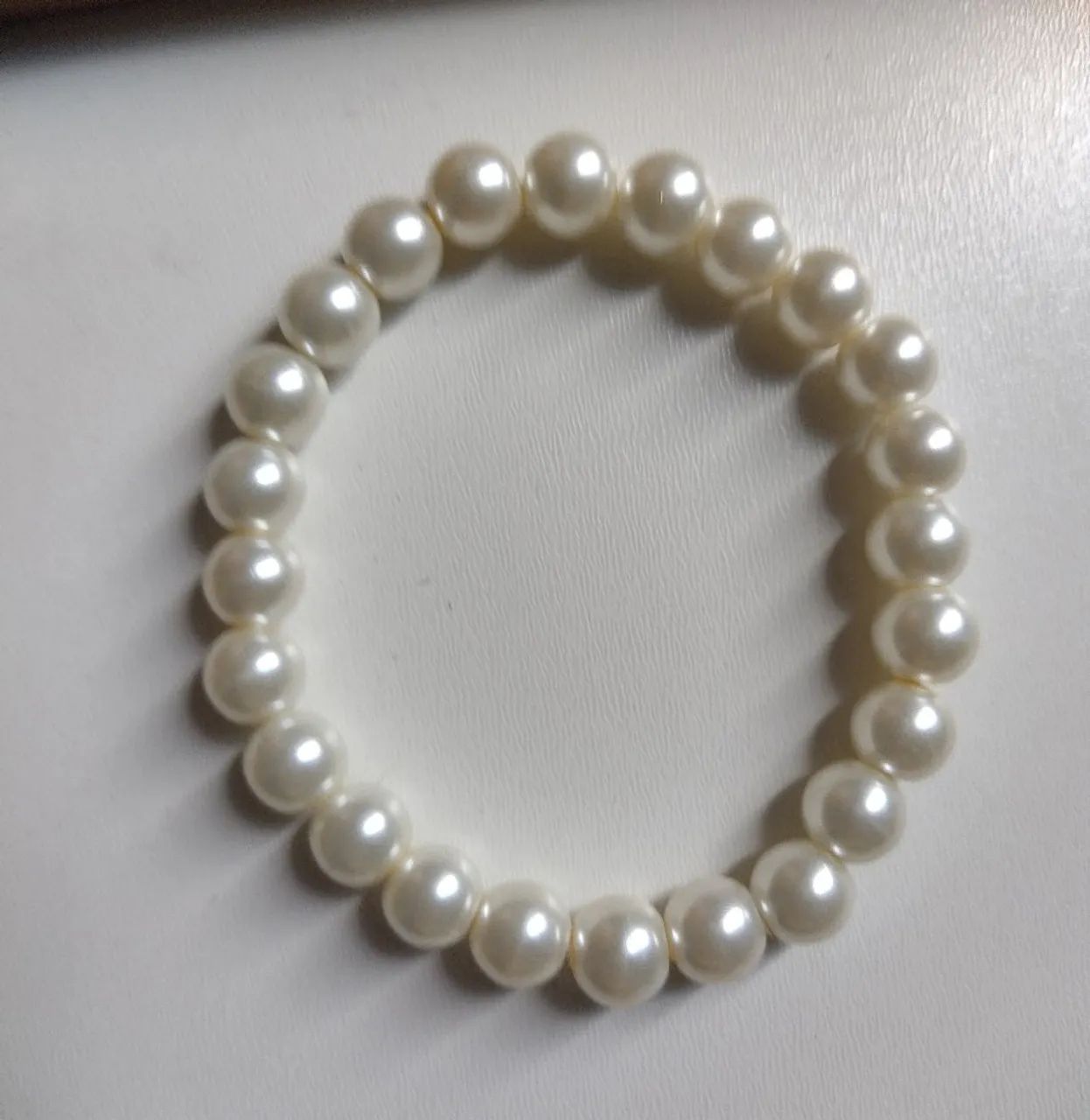Conjunto de brincos e pulseira de pérola. - Foto 3