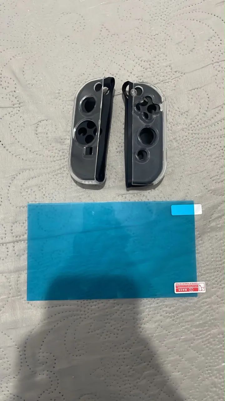 Vendo Nintendo switch oled com 5 jogos + duas cases + película extra - Foto 3