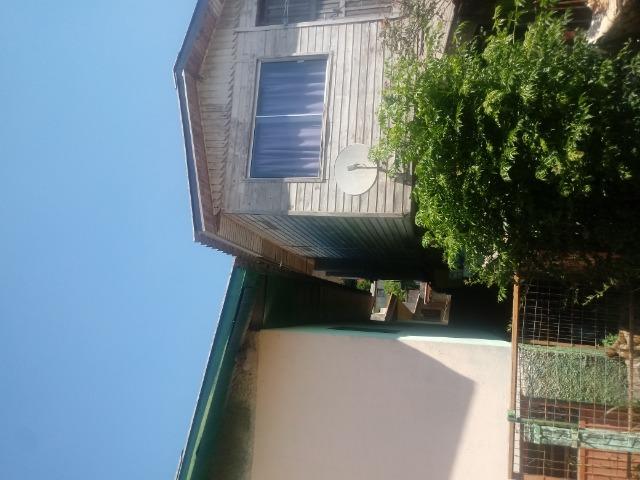 Venda de terreno com casa de madeira - Foto 13