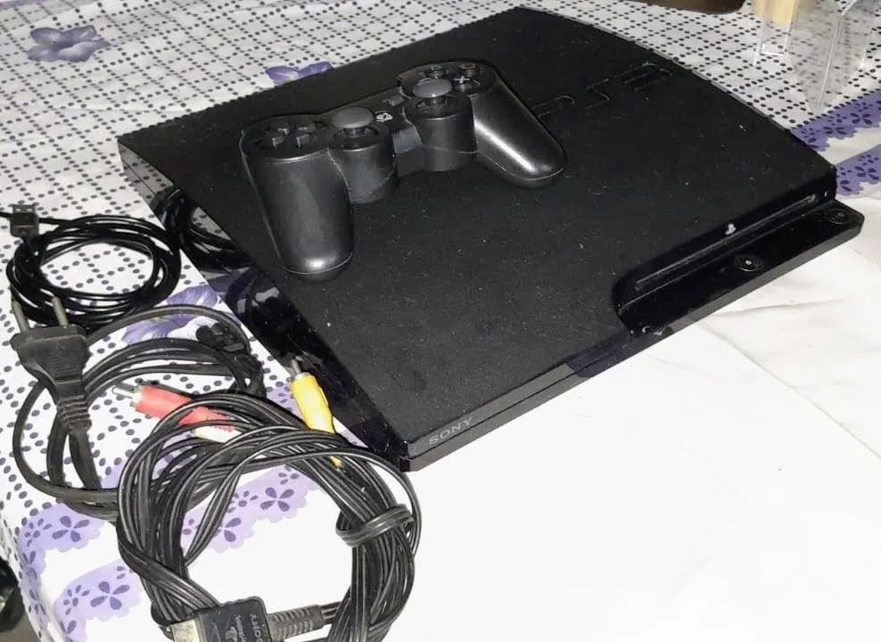 Playstation 3 ótimo com 1 controle e 14 jogos, aceitamos Pix e parcelamos nos cartões  - Foto 2
