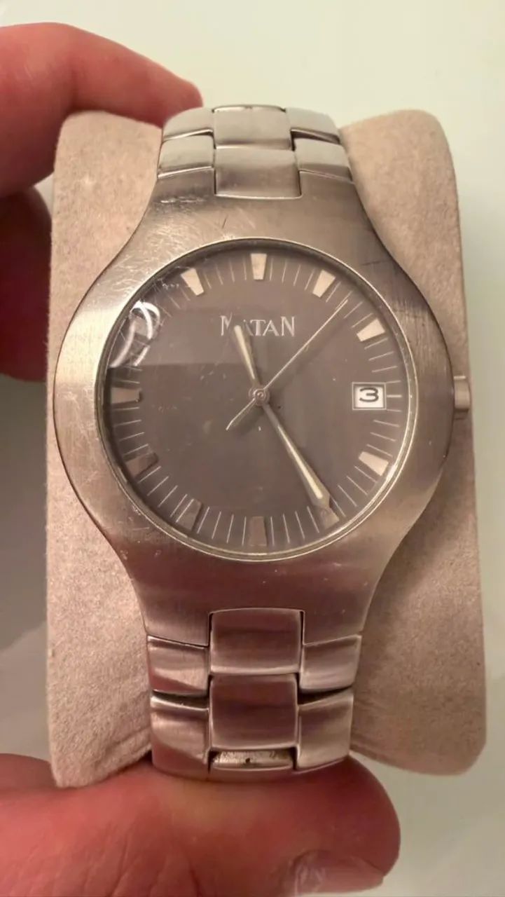 Relógio Natan, caixa e pulseira em aço inoxidável. ?
