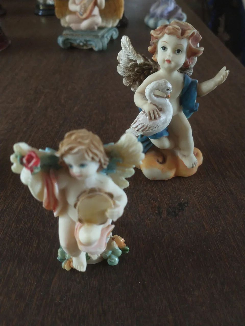4 anjinhos de resina 