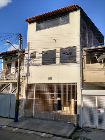 Aluguel de casa com 2 suítes, 2 quartos e garagem