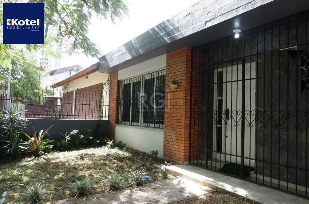 Casa no bairro Jardim Botânico de 3 dormitórios e 2 vagas