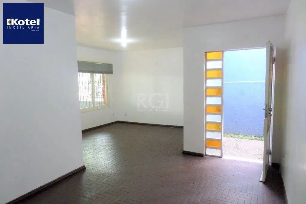 Casa no bairro Jardim Botânico de 3 dormitórios e 2 vagas - Foto 4