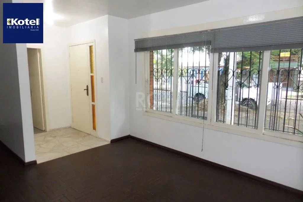 Casa no bairro Jardim Botânico de 3 dormitórios e 2 vagas - Foto 2