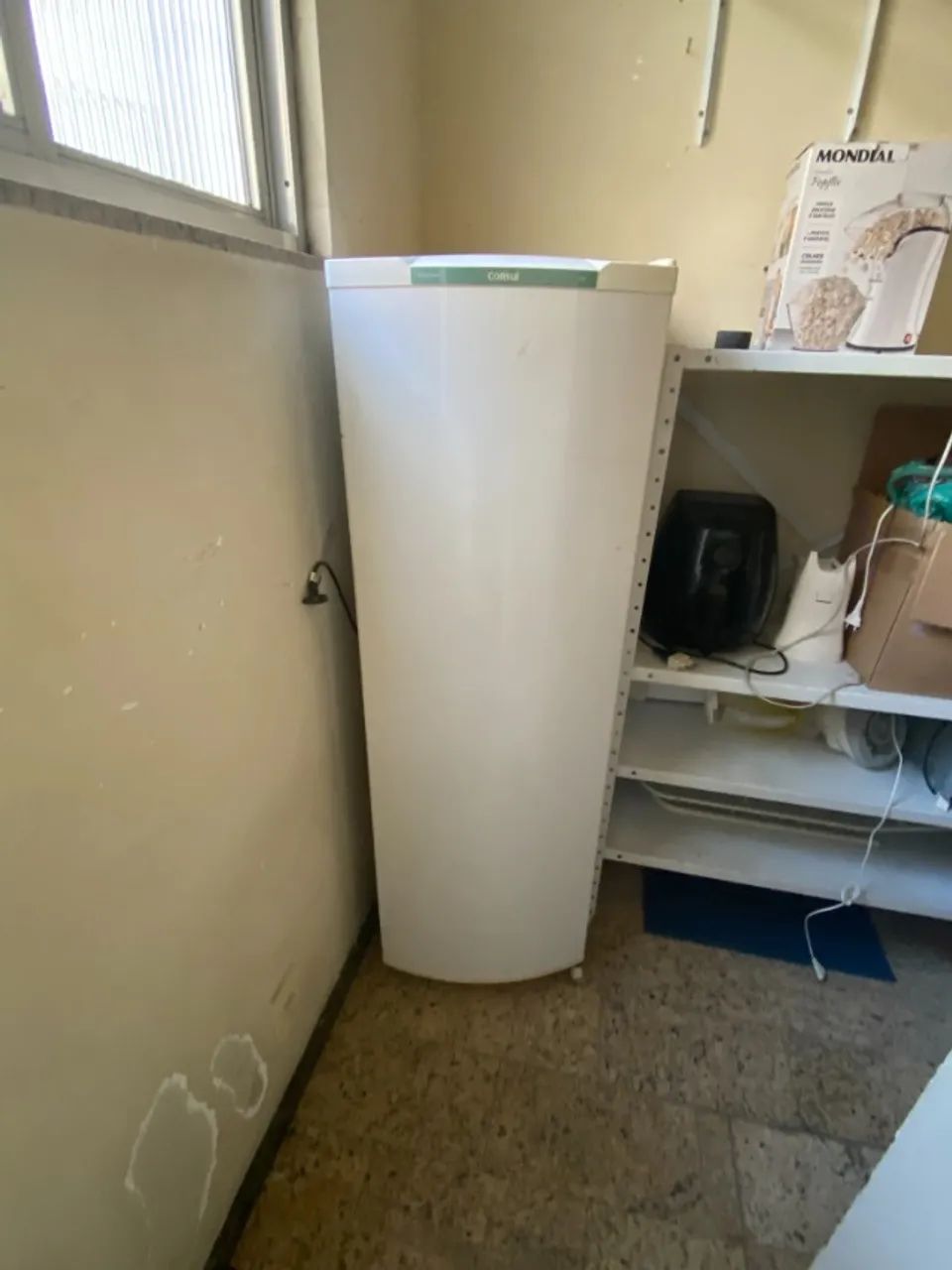 Geladeira comum com defeito