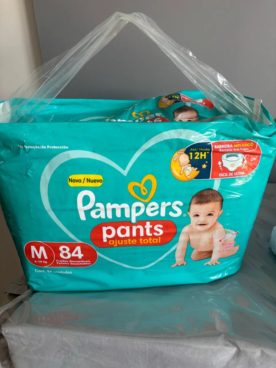 Fralda Pampers ajuste total 