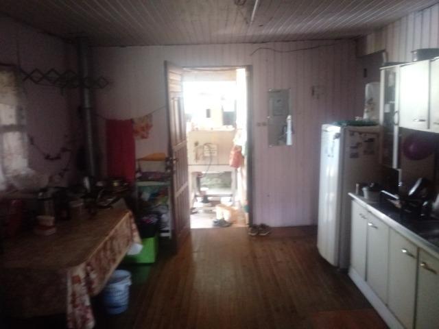 Venda de terreno com casa de madeira - Foto 12