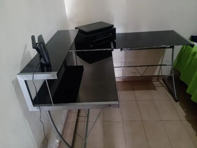 L-shaped glass desk