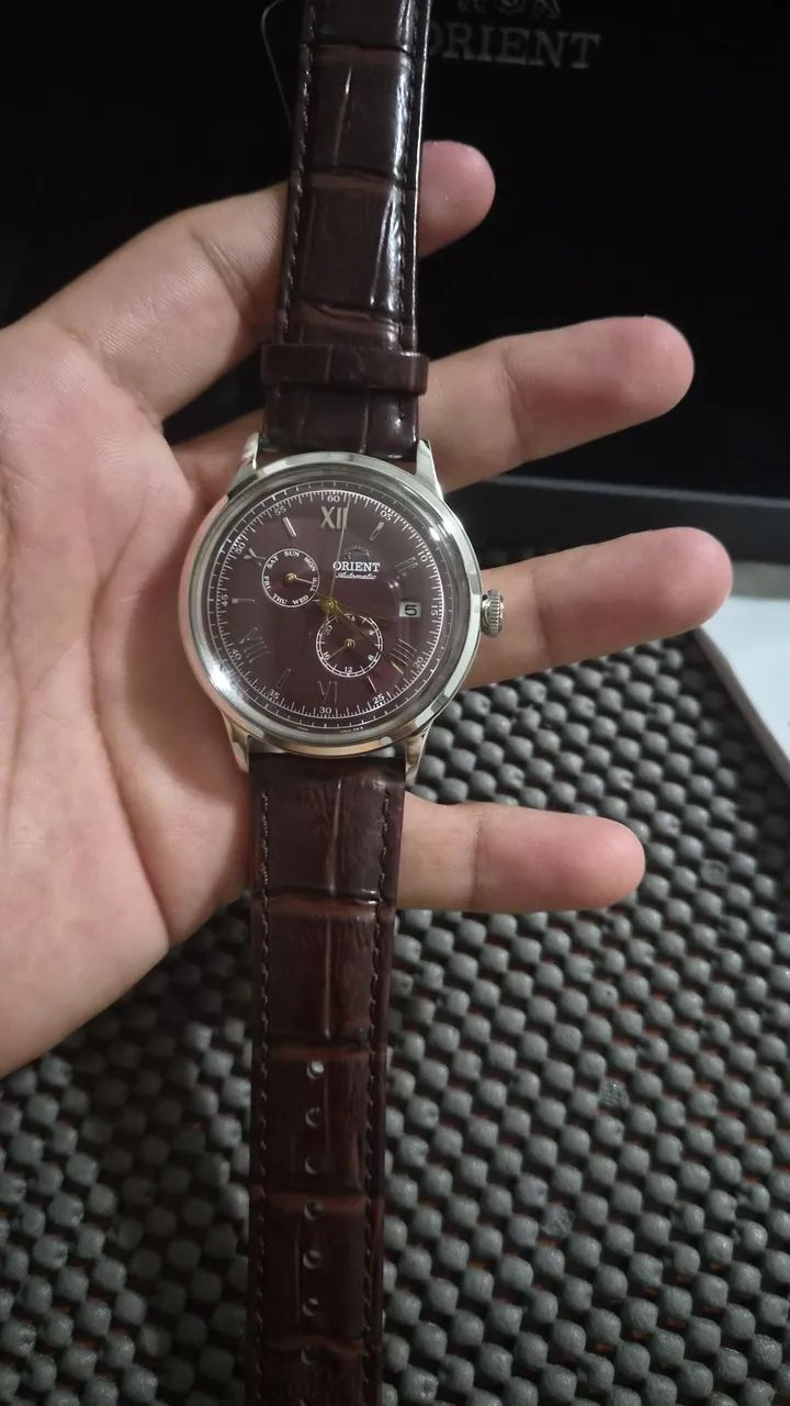 Orient bambino bege e vermelho 1999 cada