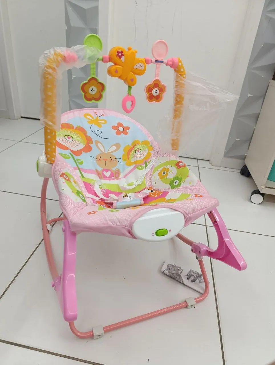 Cadeirinha que vibra e toca 