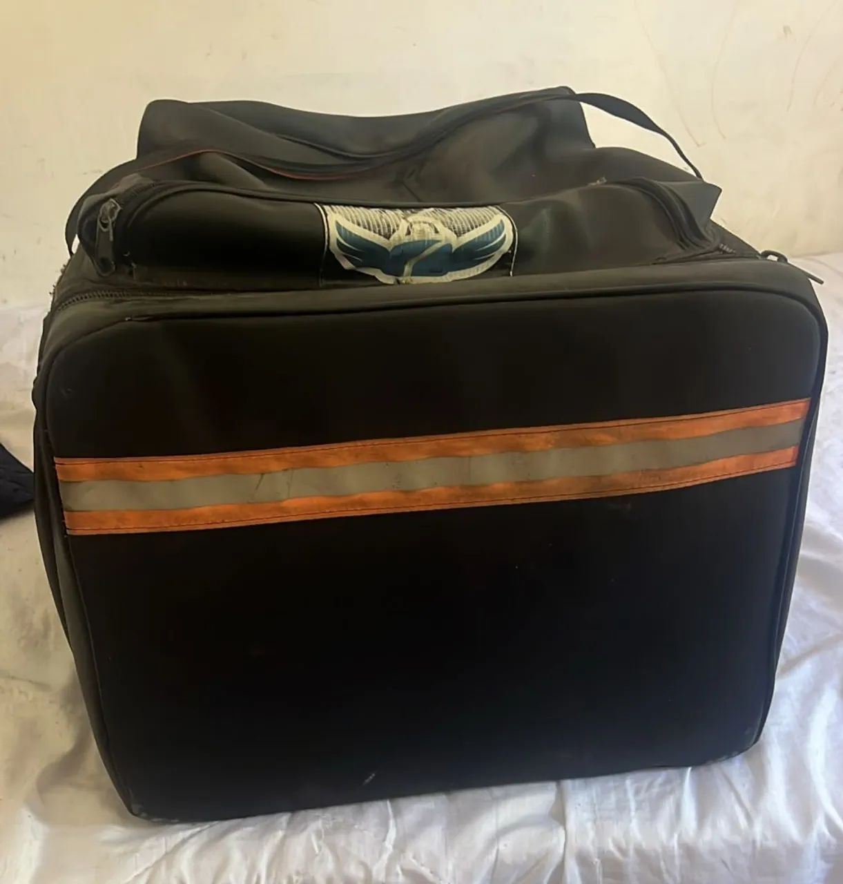Bag mais jaqueta corta vento 