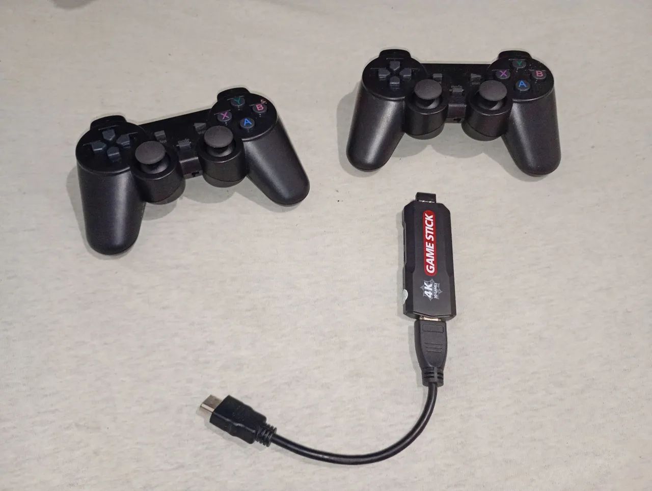Vendo game stick com 2 controles 