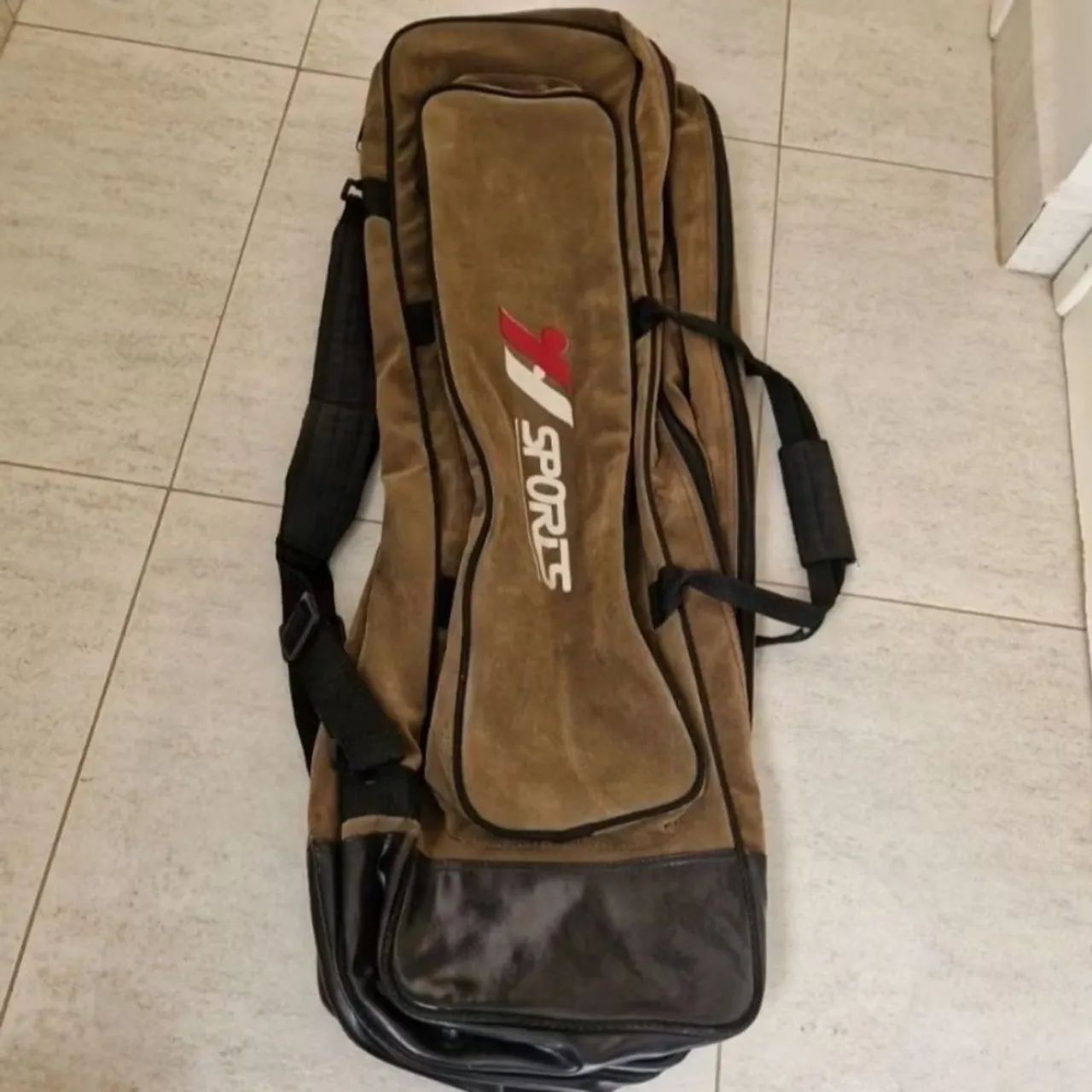 Bolsa com divisórias para costas e mão 