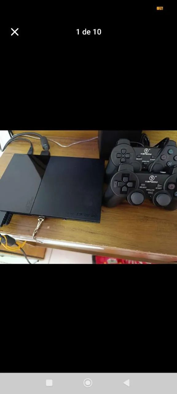 Playstation 2 conservado com vários jogos