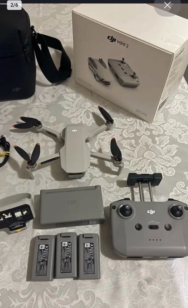 Drone DJI Mini 2 com combo fly more 3 baterias na caixa - Foto 2