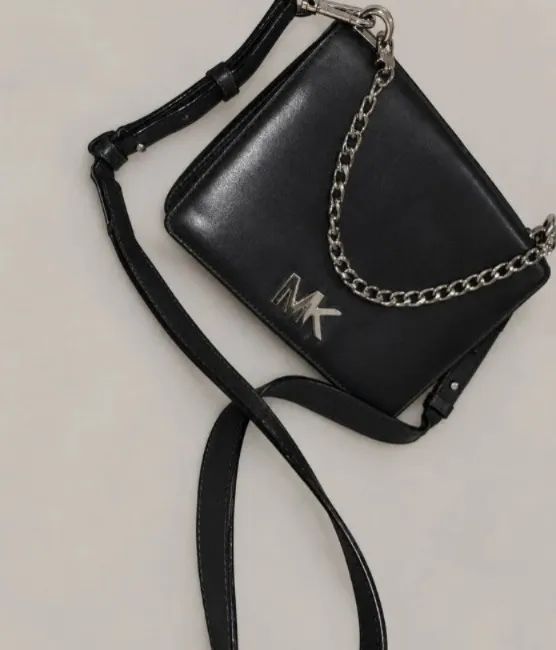 Bolsa MK original em couro 