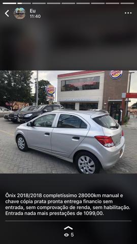 Ônix 2018 28000 km ent: 1.990,00 + 990,00