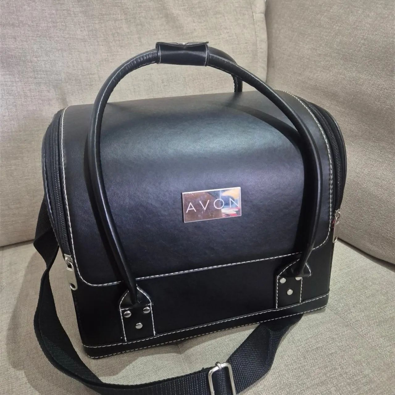 Maleta de maquiagem avon preta 