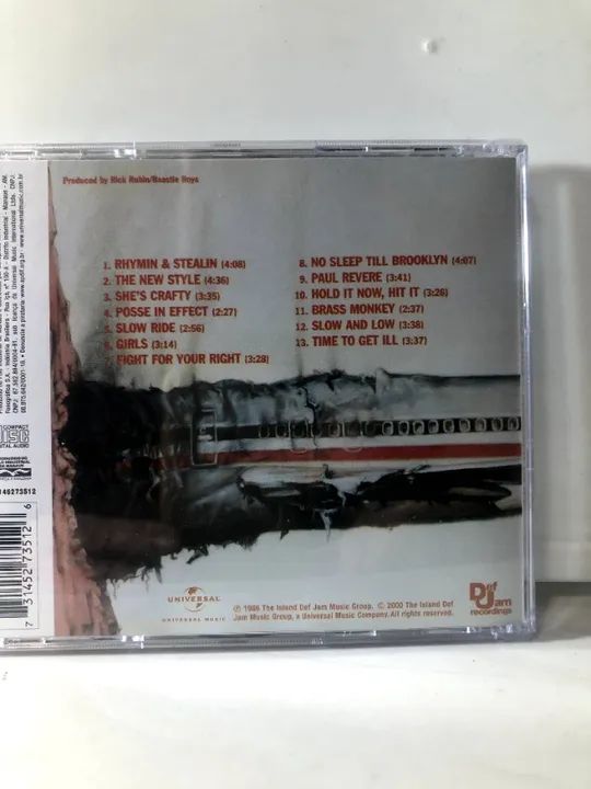 CD da banda  Beastie Boys com o título Licensed to Ill em perfeito estado de conservação e - Foto 2