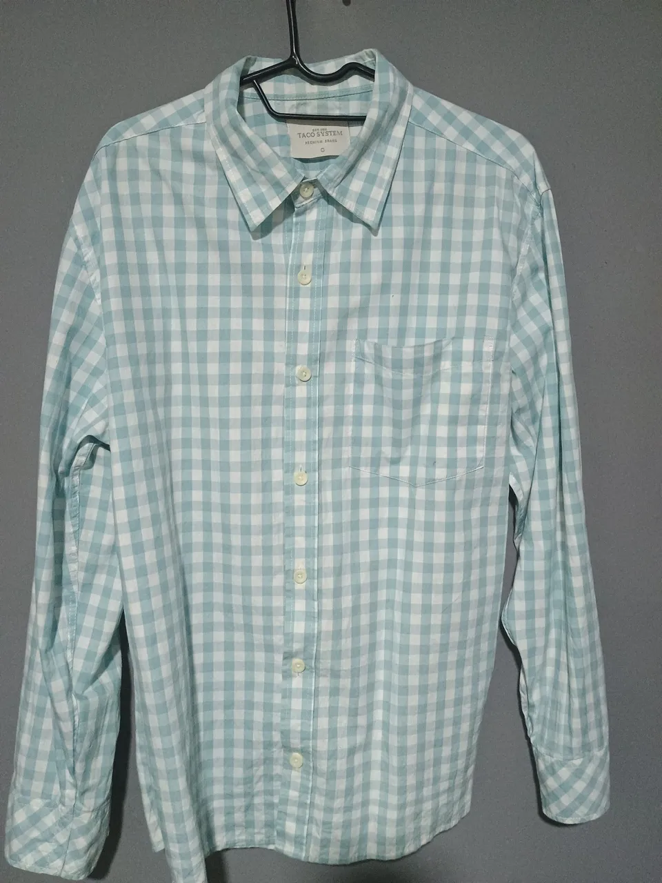 Camisa xadrez azul e branca