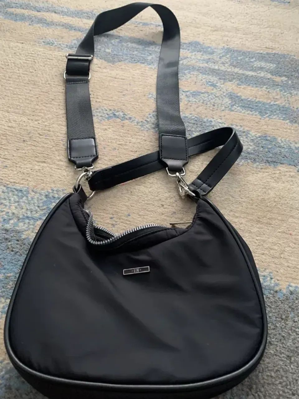 Bolsa preta de nylon