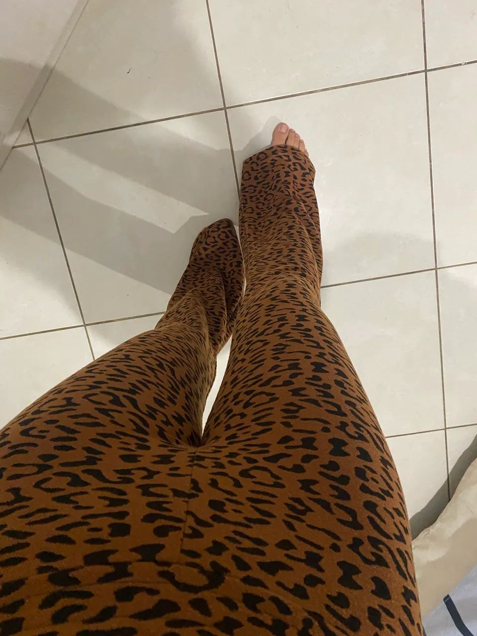 Calça de oncinha Renner 