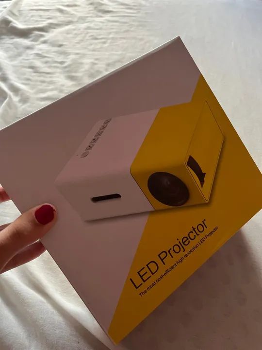 Mini projetor novo 