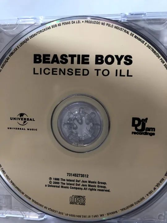 CD da banda  Beastie Boys com o título Licensed to Ill em perfeito estado de conservação e - Foto 5