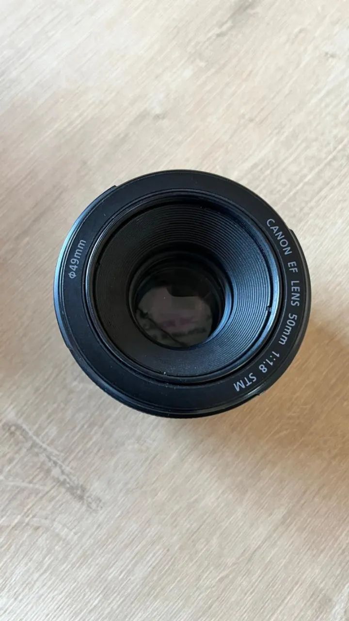 Lente Canon EF-S 18-55mm f/3.5-5.6 IS STM - Foto 4