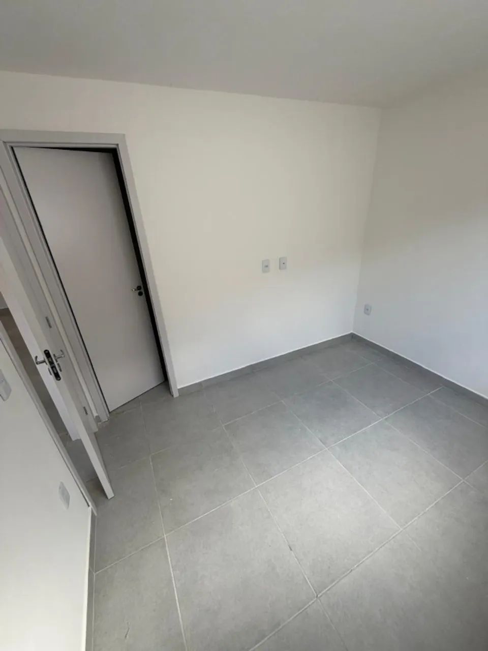 Apartamento térreo com área privativa em U