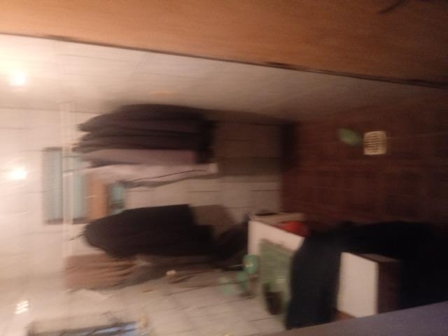 Venda de terreno com casa de madeira - Foto 7