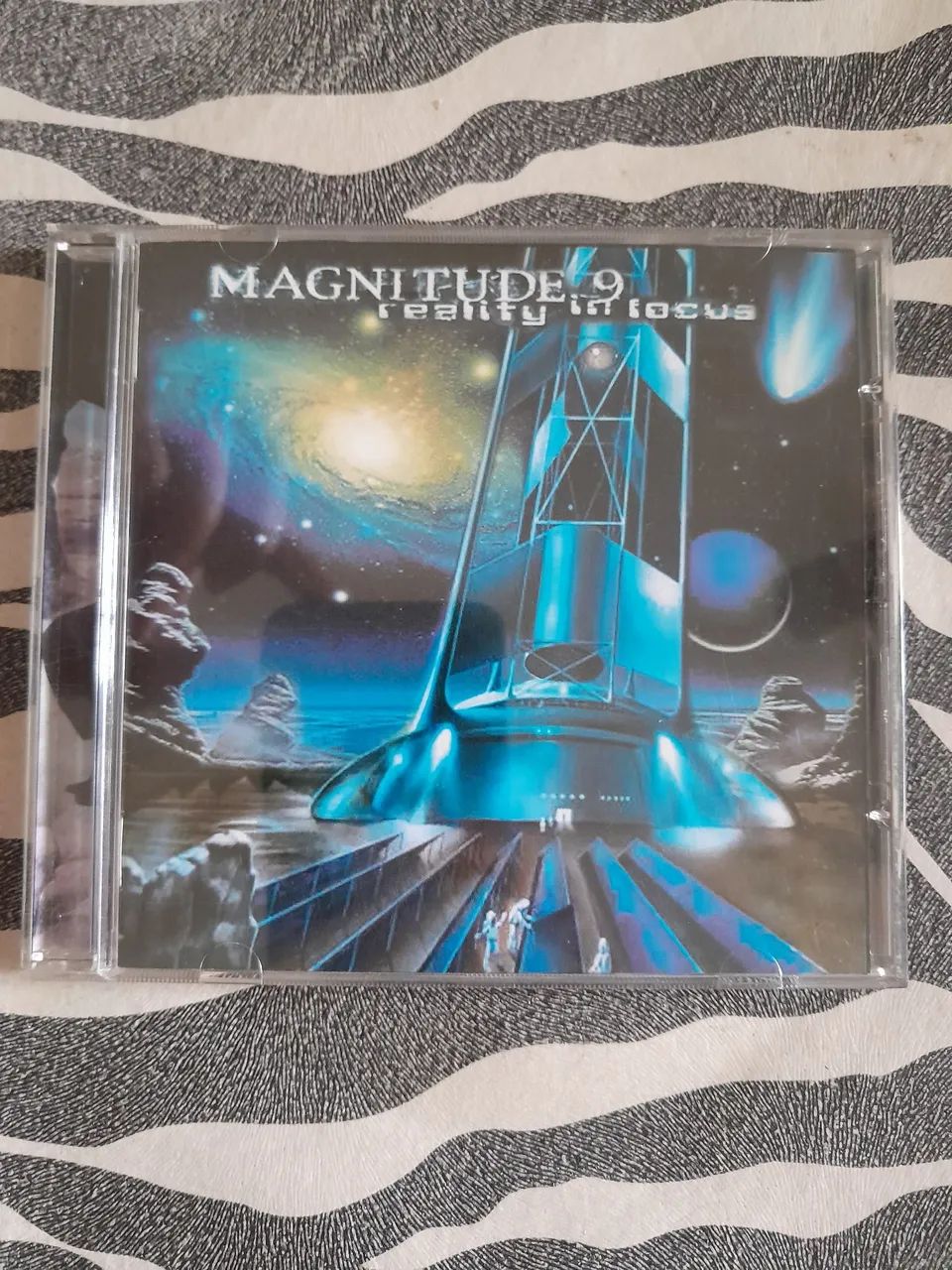 Cd Magnitude 9 - reality in focus