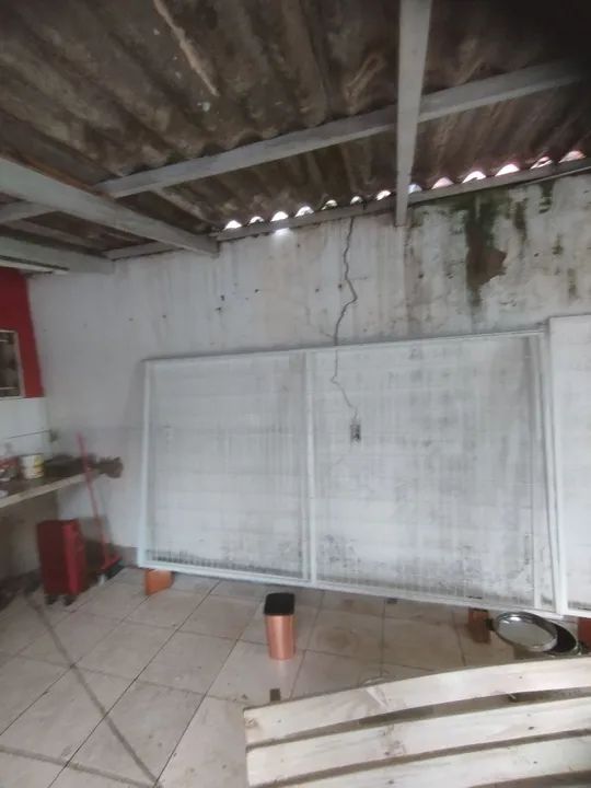 Vendo um portão de Metalon com tela 