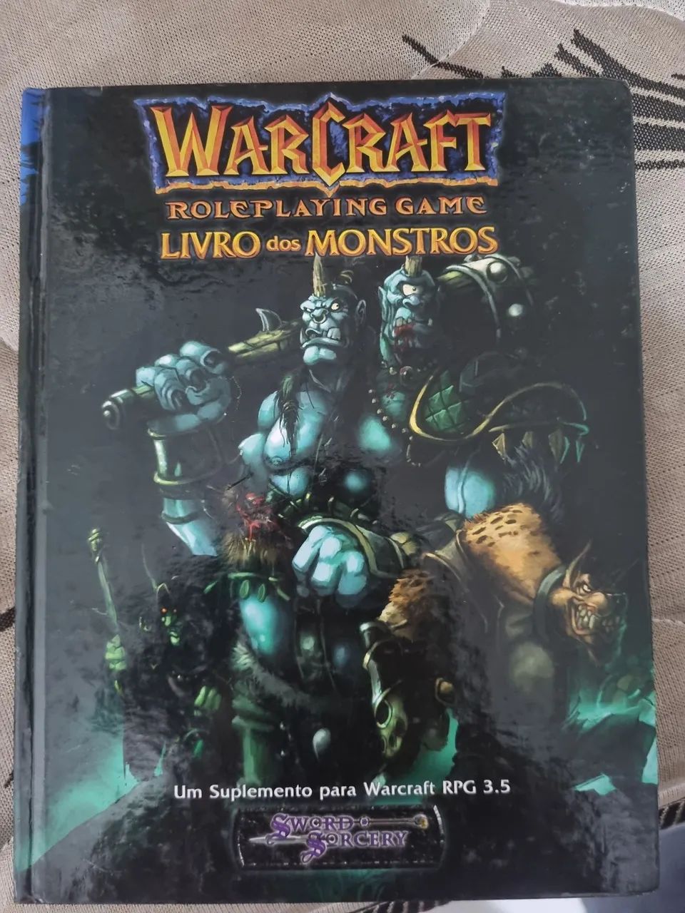 Warcraft livro dos monstros RPG