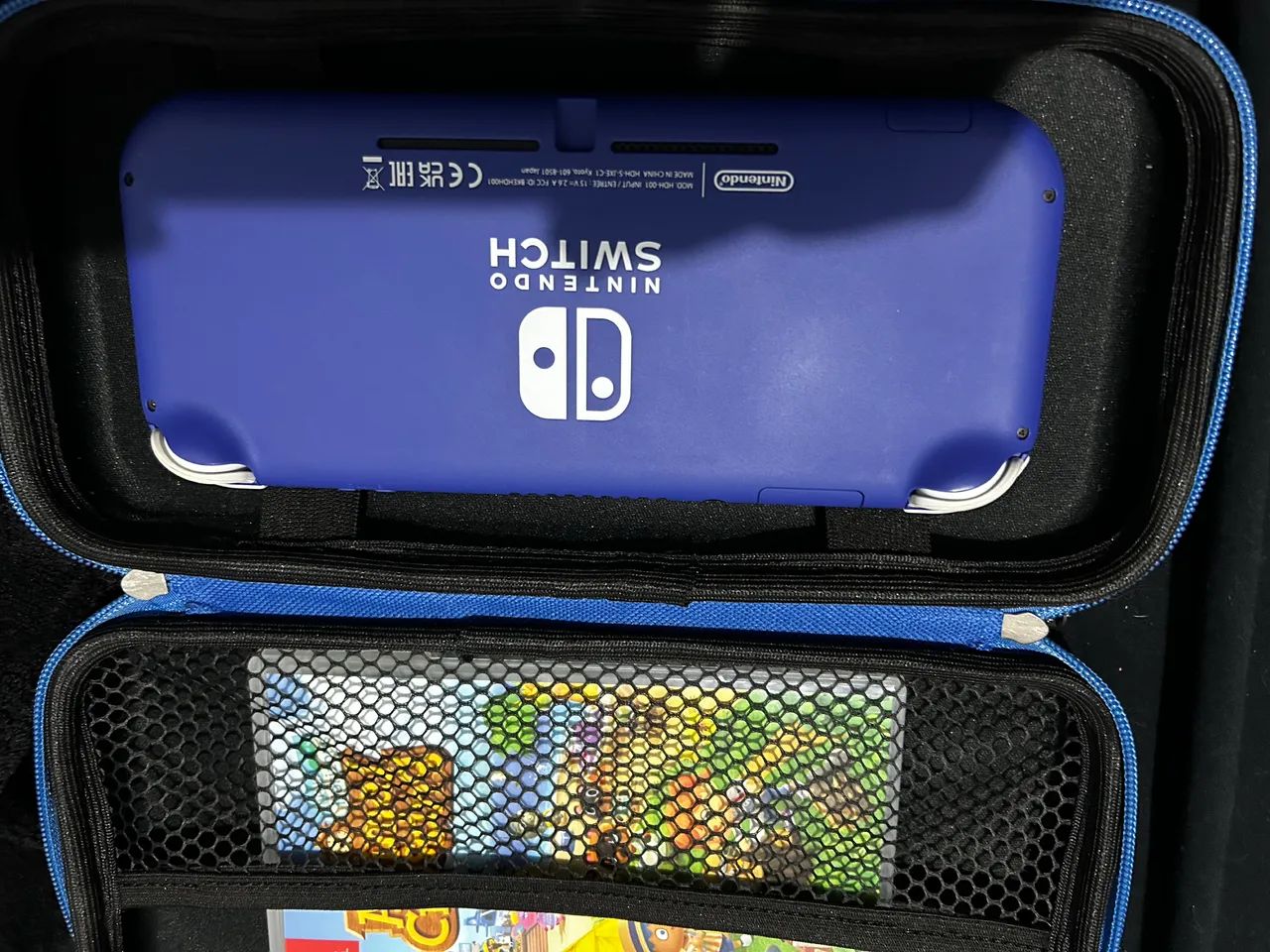 Nintendo Switch lite + jogos 64315487903747121