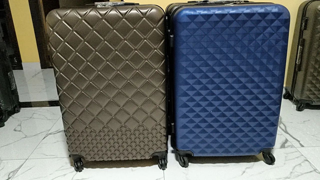 Excelente Mala de viagem de 32 kilos simples de ótima qualidade e praticidade .  - Foto 4