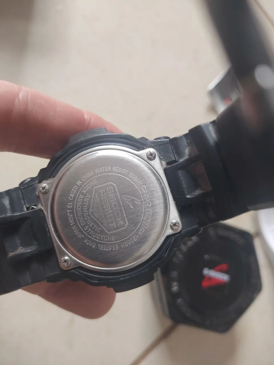 Relógio Casio G shock GA 200 manual caixa  - Foto 4