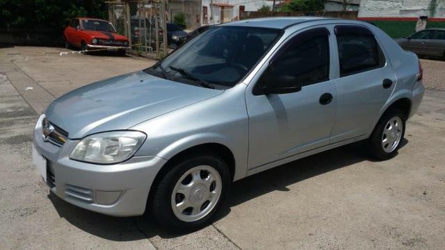 GM/ Prisma Joy 2010 1.4 Flex Prata Metálico Completo 4 Portas Excelente Estado
