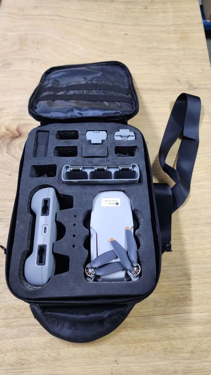 Drone dji mini 4k com bateria extra e carregador externo bolsa heliponto acessórios  - Foto 4