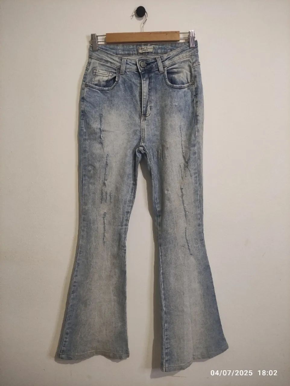 Calça Jeans Lavada Destroyed Flare Cintura Alta 