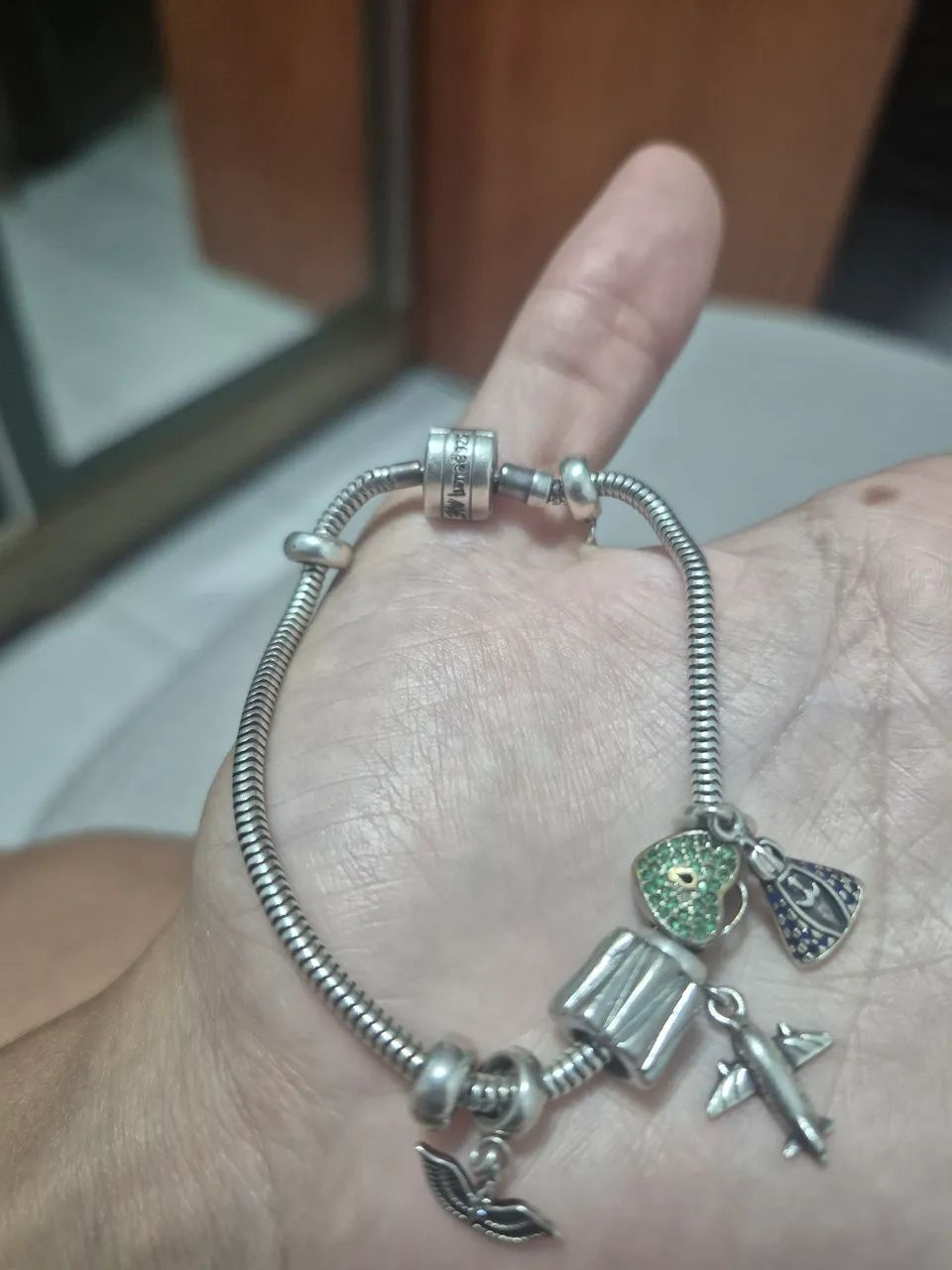 Pulseira Lumae em Prata 925, acompanhada de 3 berloques.