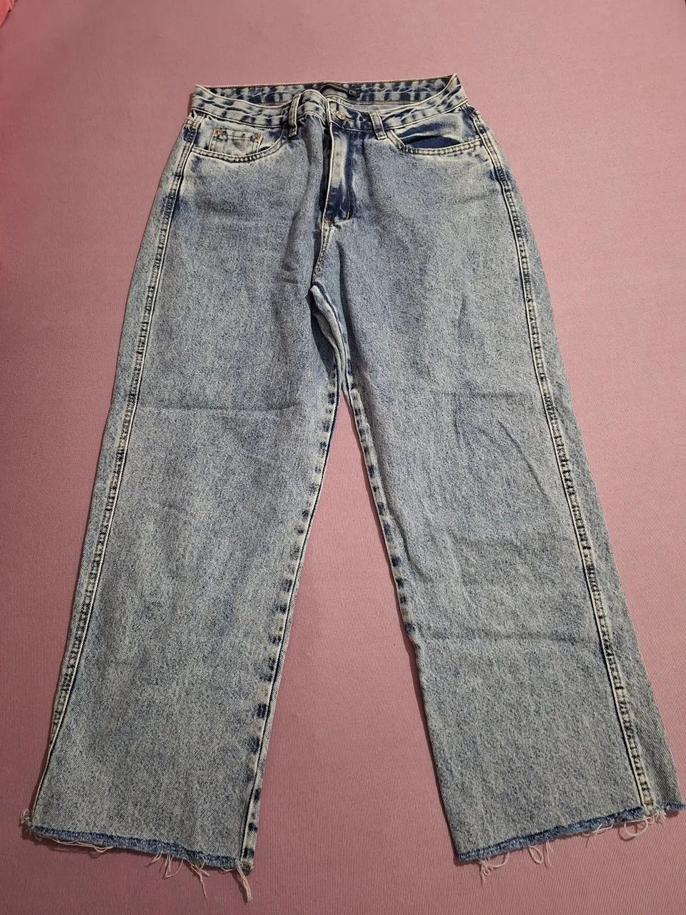 Calça jeans reta barra curta 40